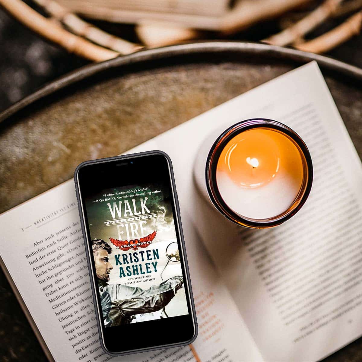 Walk Through Fire by Kristen Ashley is a motorcycle club romance that pulls you in, punches you in the gut, and will have you loving every minute of the torture