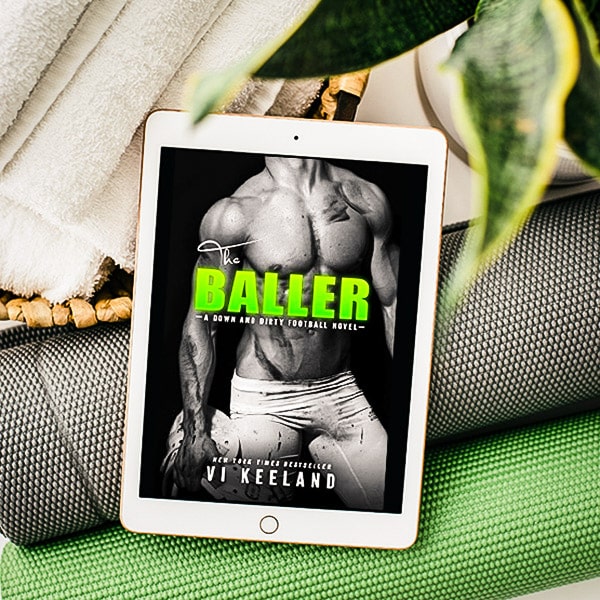 The Baller by Vi Keeland is a sports romance with a dirty-talking smart aleck who knows how to handle a ball. Plus, there's an emotional story to boot.