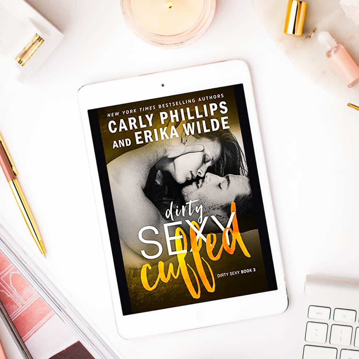 Dirty Sexy Cuffed by Carly Phillips and Erika Wilde is a contemporary romance with a good guy and dominant alpha who saves a damsel in distress with plenty of chemistry and steam!