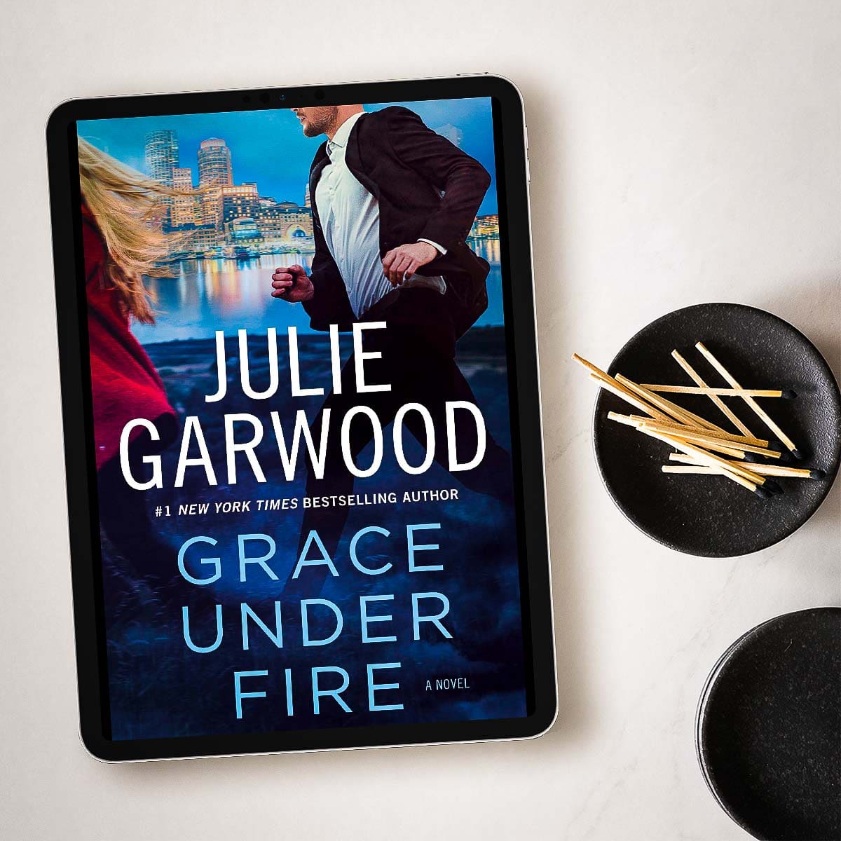 Enjoy this excerpt from GRACE UNDER FIRE by Julie Garwood, a romantic suspense and the 14th book in the Buchanan-Renard series. Be sure to grab a copy!